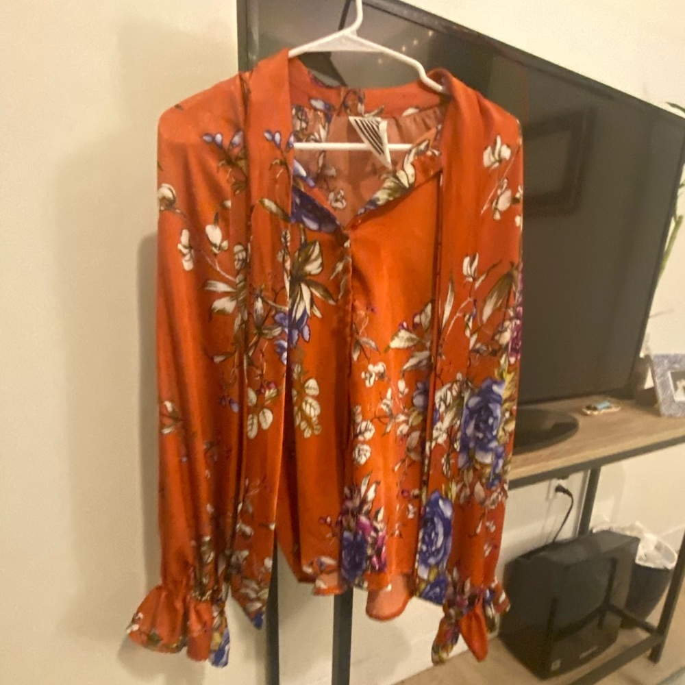 Orange tie front ruffle sleeve shirt